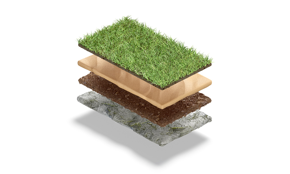Cross-section close-up of artificial turf showing polyurethane backing, drainage perforations, and infill layers engineered for freeze–thaw durability.